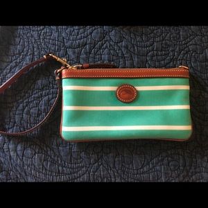 Large slim Dooney and Bourke. Wristlet